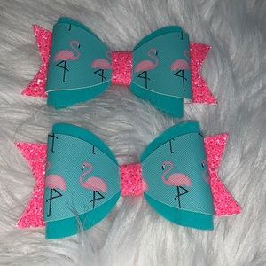 Pair of flamingo bows.